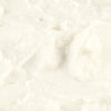 A close-up of a white, creamy substance.