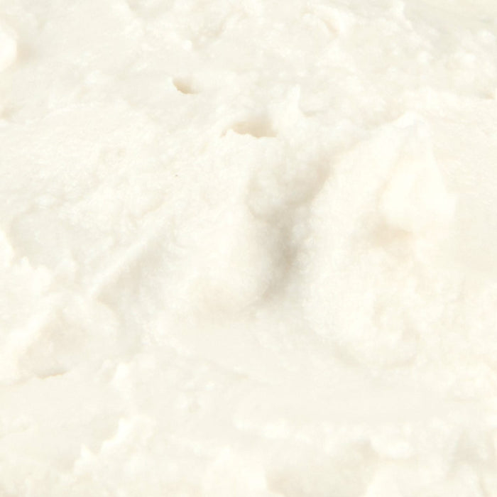 A close-up of a white, creamy substance.