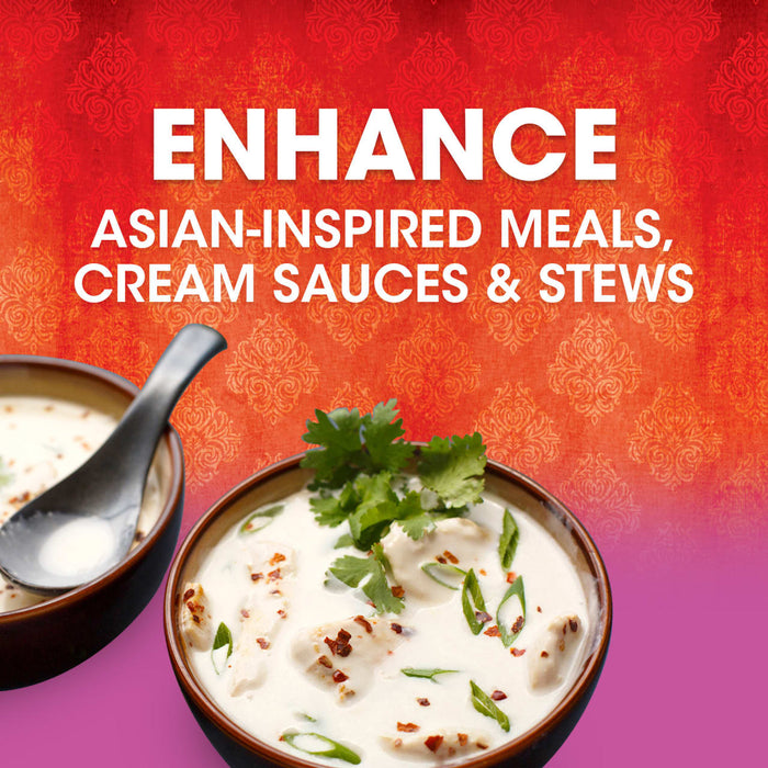 Two bowls of creamy white soup with chicken, green onions, and red pepper flakes, with the text Enhance Asian-Inspired Meals, Cream Sauces &amp; Stews above.
