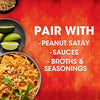 A bowl of Pad Thai noodles with peanuts chicken and cilantro with text that says Pair with - Peanut Satay - Sauces - Broths &amp; Seasonings.