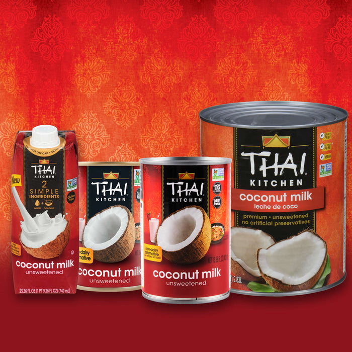 A variety of Thai Kitchen coconut milk products are displayed against a red background.