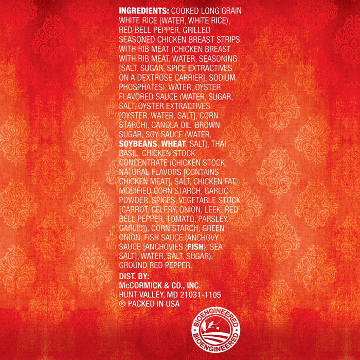 The back of a package of Thai Kitchen, 9.0 Oz, shows the ingredients list and distributor information from McCormick &amp; Co., Inc. against a red patterned background.