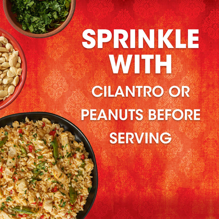 A finished dish made with Thai Kitchen, 9.0 Oz is shown in a black bowl next to bowls of cilantro and peanuts, with text suggesting to sprinkle them on top before serving.
