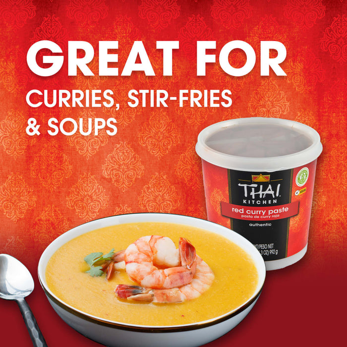 A container of Thai Kitchen red curry paste is featured alongside a bowl of soup with shrimp, highlighting its versatility for curries, stir-fries, and soups.