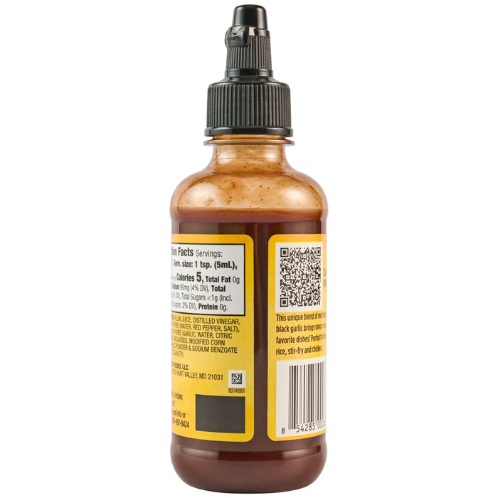 A bottle of Plum Garlic Sauce with nutrition facts and a description of the product.