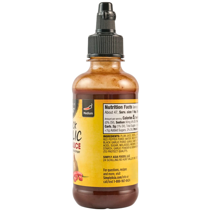 A bottle of Simply Asia Foods Black Garlic Sauce with Red Pepper.