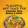 Flavorful hot sauce is advertised for chicken, rice bowls, and eggs, displayed above a bowl of noodles with greens.