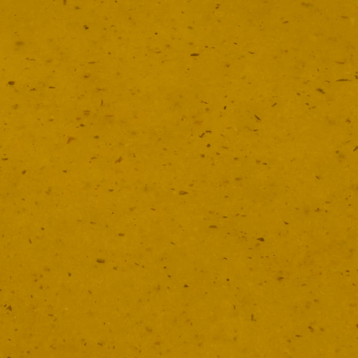 A close-up of a yellow textured surface.