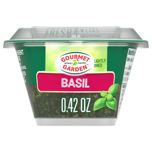 A clear plastic container of Gourmet Garden Chopped Basil, labeled 'GROWN &amp; PREPPED', 'FRESH 4 WEEKS ONCE OPENED', and 'NET WT 0.42 OZ', representing the product Gourmet Garden Basil (Case Of 72).