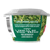 A container of Gourmet Garden chopped herbs with a barcode and instructions for use.