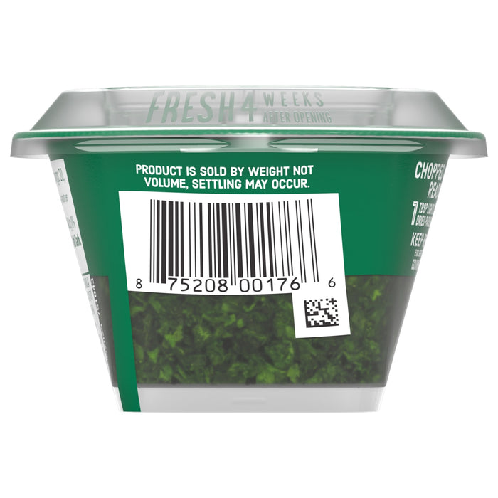 The back of a container of Gourmet Garden Parsley Seasoning Chopped .35 Oz shows the barcode and a disclaimer that the product is sold by weight, not volume.