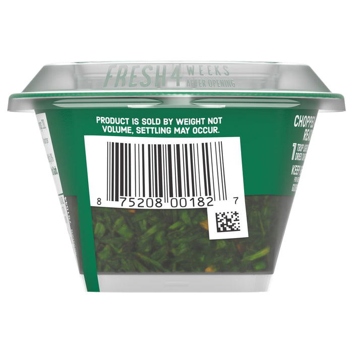 The back of a package of Gourmet Garden Chive Seasoning Chopped .35 Oz is shown, highlighting the barcode and the text Fresh 4 Weeks After Opening on the lid.