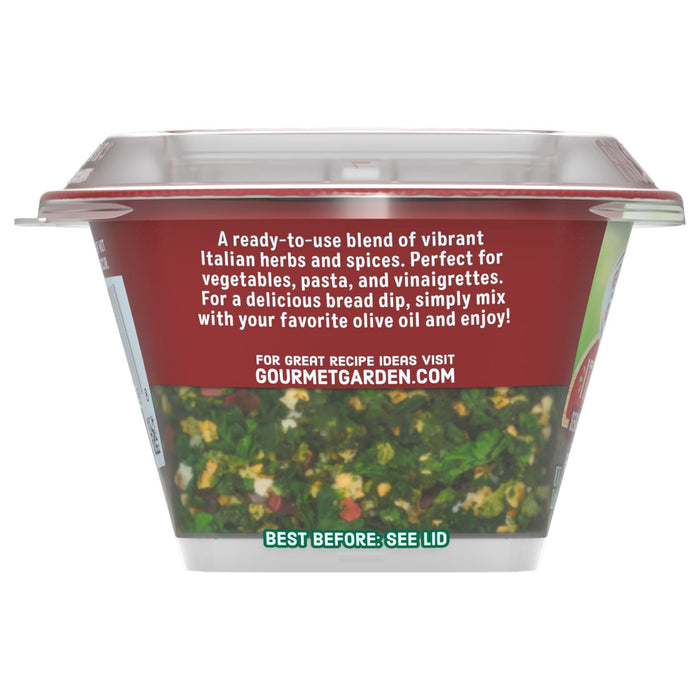 A container of Gourmet Garden Italian Herbs &amp; Spices blend, a ready-to-use mix perfect for vegetables, pasta, and vinaigrettes.