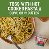 A plate of spaghetti is shown with a container of Gourmet Garden Italian Seasoning Blend, suggesting a recipe idea.