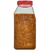 A glass jar of McCormick Garlic Pepper seasoning.
