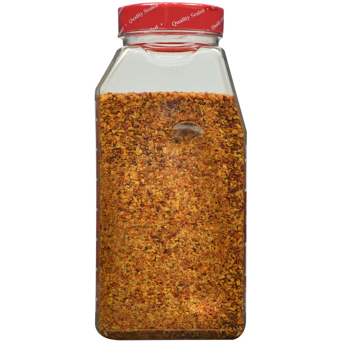A glass jar of McCormick Garlic Pepper seasoning.