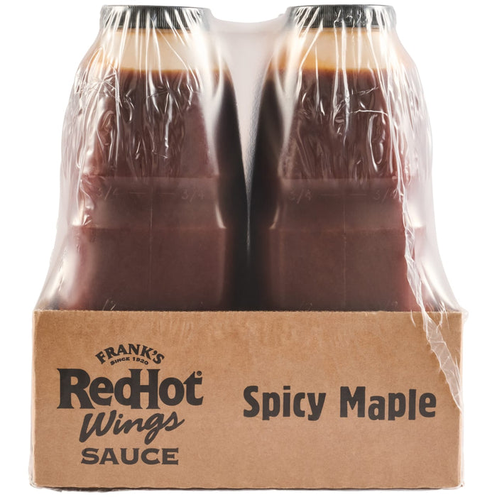 A two-pack of Frank'S Redhot Spicy Maple Wing Sauce &amp; Dip, 0.5 Gal is shown shrink-wrapped together in a cardboard tray against a white background.