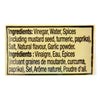 A close-up of the ingredients list for a product, including vinegar, water, spices, and garlic powder.