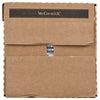 A brown cardboard box with the McCormick logo and a nutrition label peeking out from a tear.