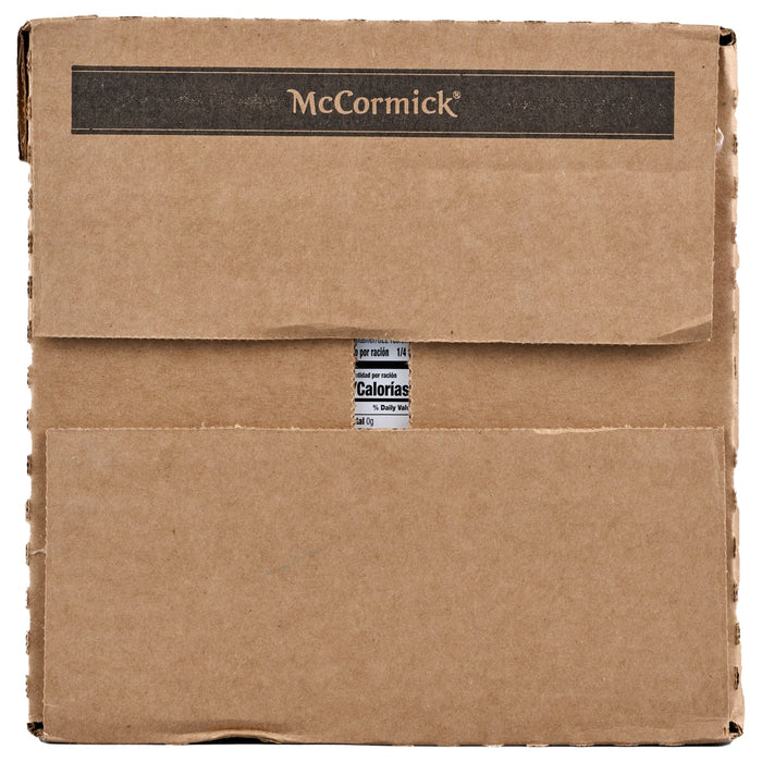 A brown cardboard box with the McCormick logo and a nutrition label peeking out from a tear.