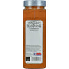 A McCormick for Chefs Moroccan Seasoning jar with a barcode and ingredients listed on the label.