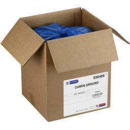 A cardboard box with a blue bag inside, labeled McCormick Culinary Cumin Ground.