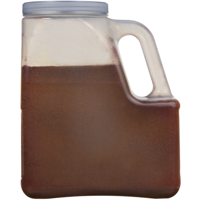 A clear plastic jar filled with a brown powder.