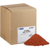 A box of McCormick Culinary Cayenne Red Pepper with a pile of the spice in front of it.