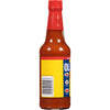 A bottle of Old Bay Hot Sauce with a yellow label and a barcode.