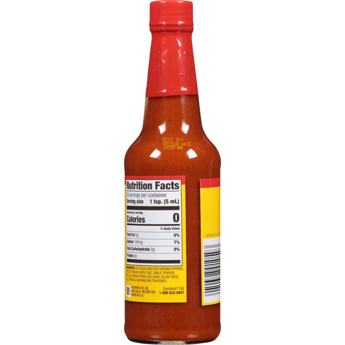 A bottle of McCormick Hot Sauce with nutrition facts and ingredients listed on the label.