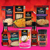 A variety of Thai Kitchen products are displayed including fried rice stir-fry rice noodles coconut whipping cream and red curry paste.