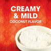 A bowl of creamy and mild coconut flavored product is displayed against a red patterned background.