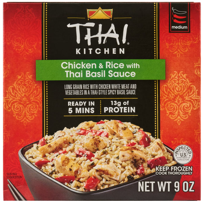 The front of the box for a package of Thai Kitchen, 9.0 Oz, Chicken &amp; Rice with Thai Basil Sauce shows a bowl of the prepared meal as a serving suggestion.
