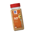 Seasoning jar with red lid and orange label on a white background