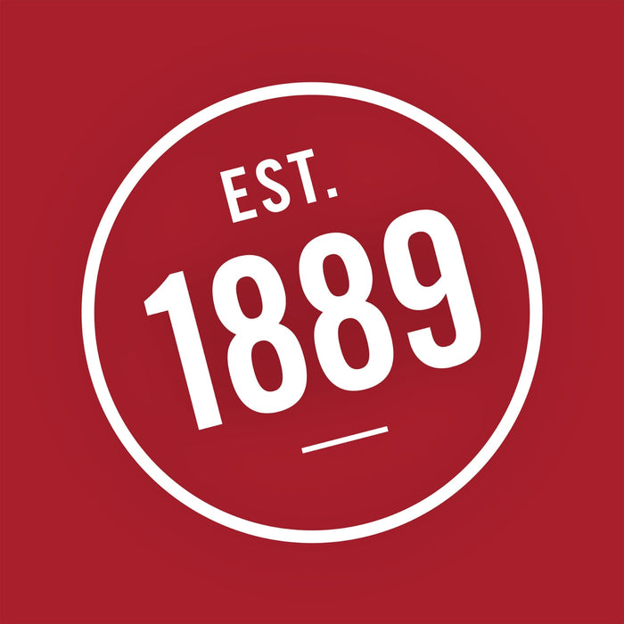 A white circle with the text EST. 1889 on a red background.