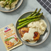 McCormick Parmesan Garlic sauce mix with a serving suggestion of chicken, mashed potatoes and asparagus.