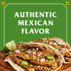 Two tacos filled with chicken cheese onions and jalapenos with the words Authentic Mexican Flavor in a green box.