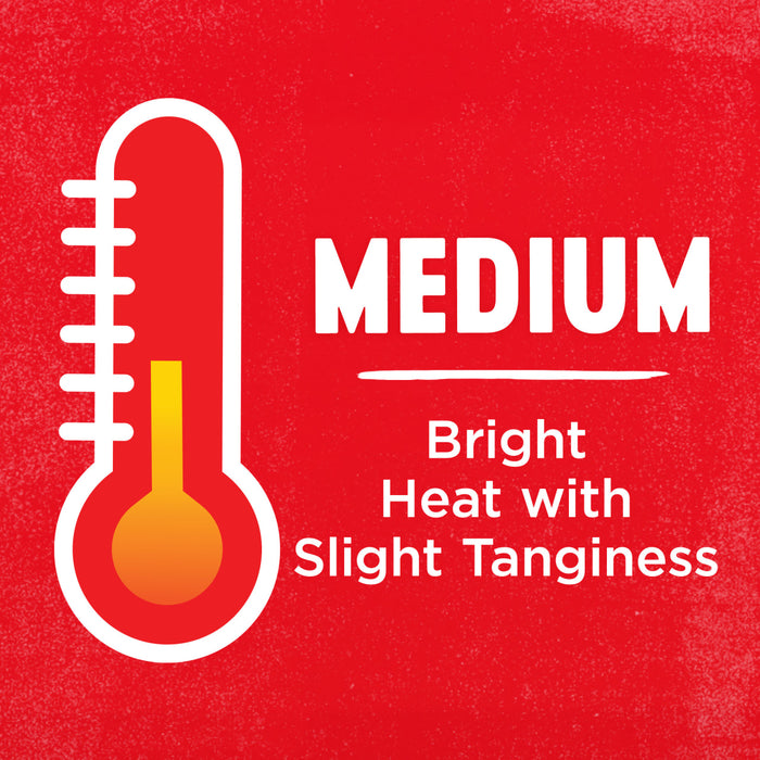 An illustration of a thermometer with a medium heat level, indicating a bright heat with slight tanginess.