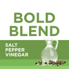A glass pitcher of vinegar with salt and peppercorns on a green background with the text BOLD BLEND SALT PEPPER VINEGAR