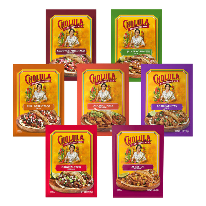 A collage displays seven different packets of Cholula Seasoning Mix, including Smoky Chipotle Taco, Jalapeño Lime, Chili Garlic Taco, Original Fajita, Pork Carnitas, Original Taco, and Al Pastor flavors.