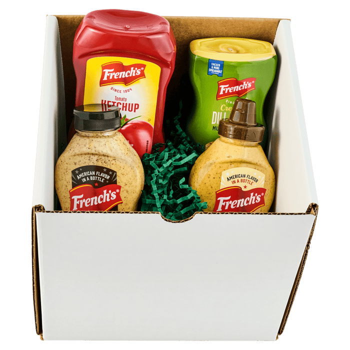 A gift box containing French's ketchup, mustard, and crispy fried onions.