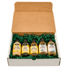 A gift box containing five bottles of different flavors of BBQ sauce.