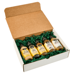 A gift box containing five bottles of different flavors of BBQ sauce from a brand called BBQ Island.