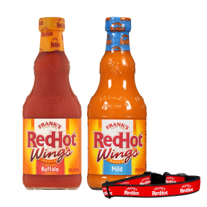 Two bottles of Frank's RedHot Wings sauce, one in a hot flavor and the other in a mild flavor, are displayed next to a Frank's RedHot dog collar.