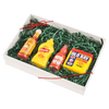 A gift box containing Cholula hot sauce, French's mustard, Heinz ketchup, and Old Bay seasoning.