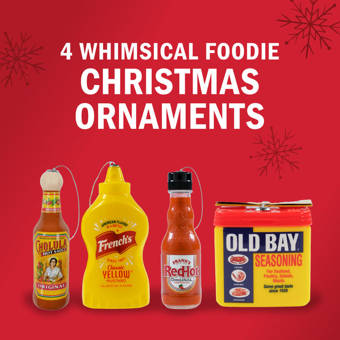 Four whimsical foodie Christmas ornaments featuring Cholula Hot Sauce, French's Mustard, Frank's RedHot Sauce, and Old Bay Seasoning.