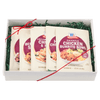 A gift box containing four McCormick Chicken Burrito Bowl seasoning packets.