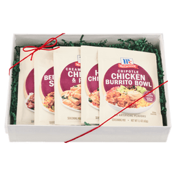 A gift box containing four McCormick Chicken Burrito Bowl seasoning packets.