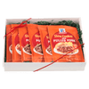 A gift box containing multiple packets of McCormick Slow Cooker Pulled Pork seasoning mix.