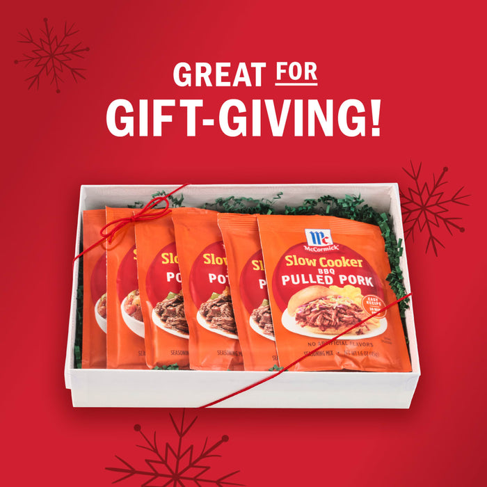 A gift box filled with McCormick Slow Cookers Pulled Pork seasoning packets, perfect for gift-giving.